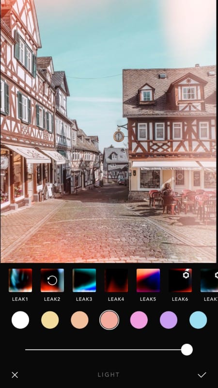 Screenshot of a photo editing app, adding lightening effects into an image